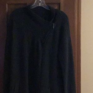 100% cashmere sweater coat.